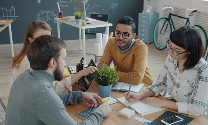 A team collaborating around a table in an office